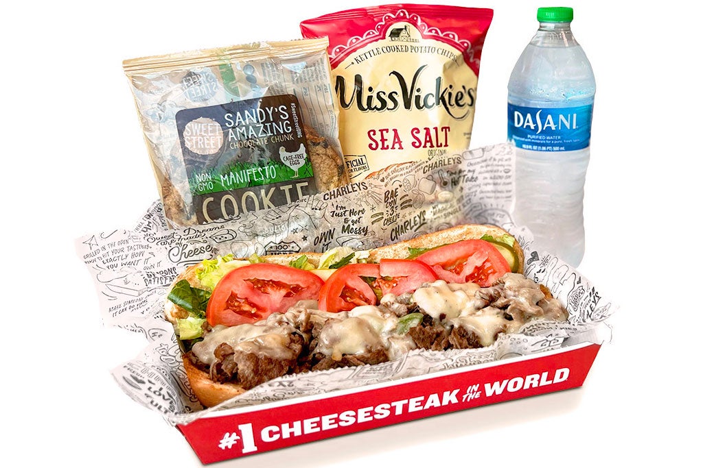 Charleys catering of philly cheesesteak sandwich and chips, charleys wings catering